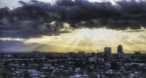 city mountain sunrise clouds