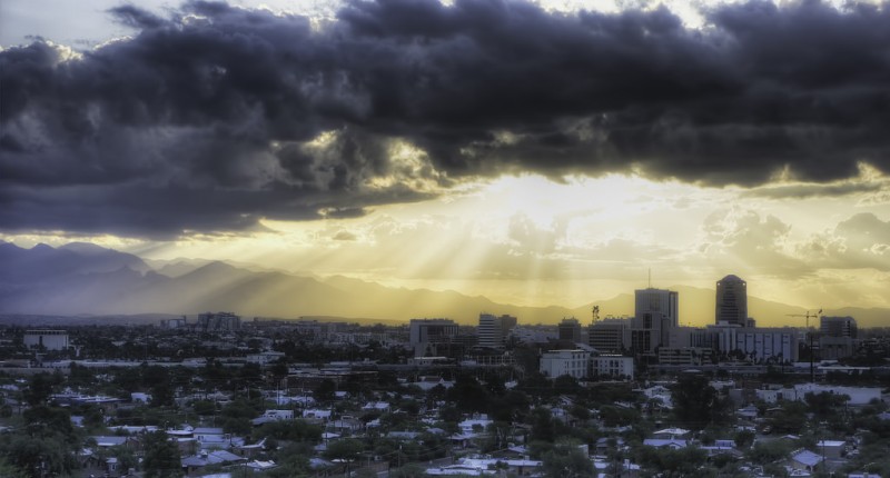 city mountain sunrise clouds