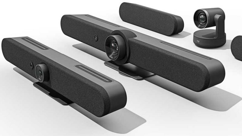 A series of Logitech devices featuring the Rally Bars and other cameras, black, sleek, rounded, with lenses and speakers covered with fabric and plastic.