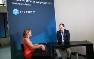 Patrick Palomo, VP of solutions engineering at Smarsh Inc taling to theCUBE about AI in financial communications at AWS Financial Services Symposium 2024