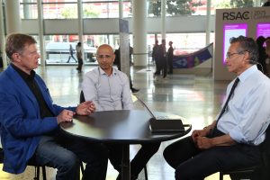 Oron Noah, vice president of product, extensibility and partnerships at Wiz Inc., and Anton Chuvakin (left), senior security staff at the Office of the CISO at Google Cloud, talk to theCUBE during RSAC 2025 about why agentless cloud security is gaining steam.