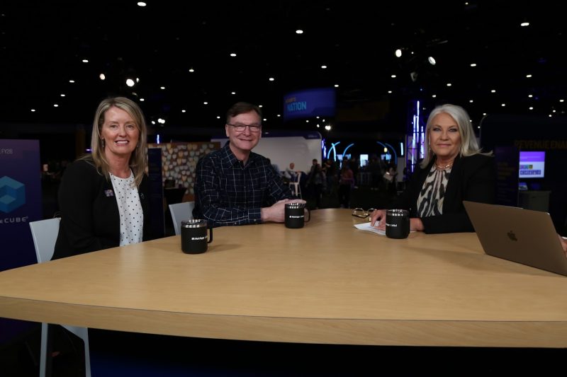 Jessica Yeck, SVP at TD SYNNEX, Bill Pearson, VP at Intel, and Jessica Flinders, SVP at NetApp, talk with theCUBE about AI deployment during NetApp's "Architecting Outcomes in the Era of Intelligence" event - 2025.