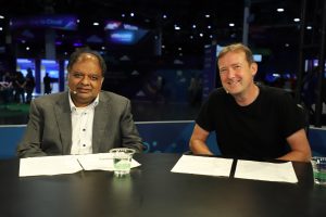Kumaran Siva (left), corporate vice president of strategic business development at Advanced Micro Devices Inc. and Paul Turner, vice president of products, VMware Cloud Foundation Division, at Broadcom Inc., talk with theCUBE about GPU virtualization – VMware Explore 2025.