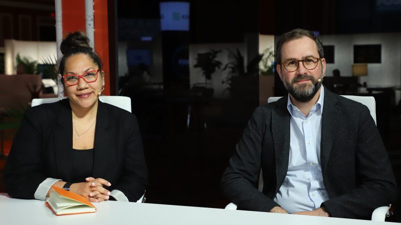 Misa Rawlins, managing director at consulting firm Deloitte Consulting LLC, and Alex Jackson, partner at Deloitte, talk with theCUBE during UiPath Fusion 2025.