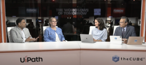 Satish Balasubramanian, vice president and head of architecture and shared services at Deluxe Corp., and Kari Mesick, business lead of treasury services at Deluxe Corp., talk with theCUBE AI agents in finance — UiPath Fusion 2025.