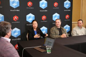 Julia Chen, VP of Partner Core at AWS, Robert Occhialini, CTO of the World Surf League, Gabriel Romero, CMO of AllCloud, discuss the new surfing smart watch with theCUBE's John Furrier at AWS reInvent 2025.