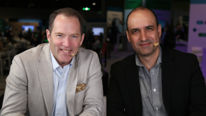 Juan Hurtado, VP of business intelligence and data analytics at Ingersoll Rand Inc. (left) and Drew Clarke, EVP of product and technology at QlikTech International AB (right), talk to theCUBE about conversational analytics, the AI factory model, and scaling enterprise AI — Qlik Connect 2026