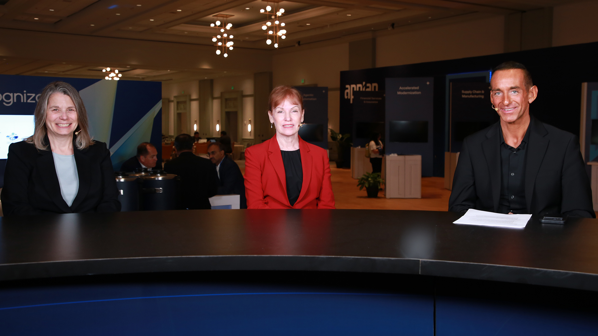 Kathy Malsch, senior director, Center for Digital Technology, at Pfizer, Aynn Furie, VP of enterprise travel, meetings and healthcare engagement at Pfizer and Gregg Aldana, VP of solutions consulting at Appian discuss regulated industry AI at Appian World 2026