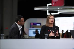 Bria Huber (right), Global Cloud Alliance Leader at Red Hat, and Hemant Mohan (left), Global Head of Strategic Alliances at AWS, talk to theCUBE about how Red Hat OpenShift Service on AWS drives cost control, virtualization modernization and sovereignty via AWS Marketplace, at Red Hat Summit 2026.
