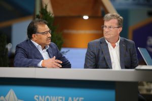 Vinayak Kagalkar, senior vice president, global chief information officer and chief technology officer of Clover Network LLC, a Fiserv company, and Mike Blandina, chief information officer of Snowflake Inc., talk with theCUBE about vibe coding, AI-assisted software development and change management at Snowflake Summit 2026.