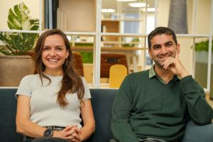 Crux AI founders Julie Kheyfets and Krishna Kulkarni sitting left to right